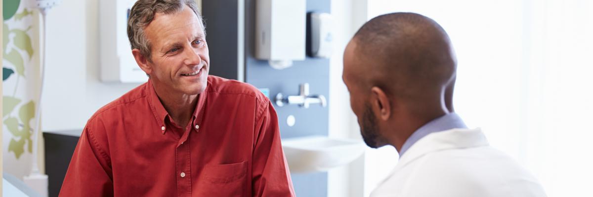 Patient and doctor going over paperwork, Physical Exam